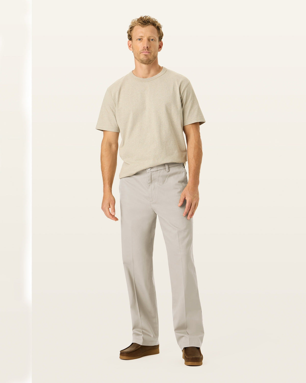 Front view of model wearing Cloud Signature Iron Free Khakis, Relaxed Fit with Stain Defender®.