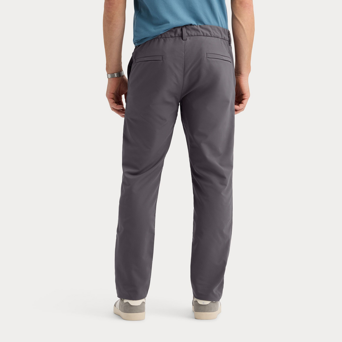 Back view of model wearing Boulevard Go Pro Pant with AceFlex, Slim Fit.