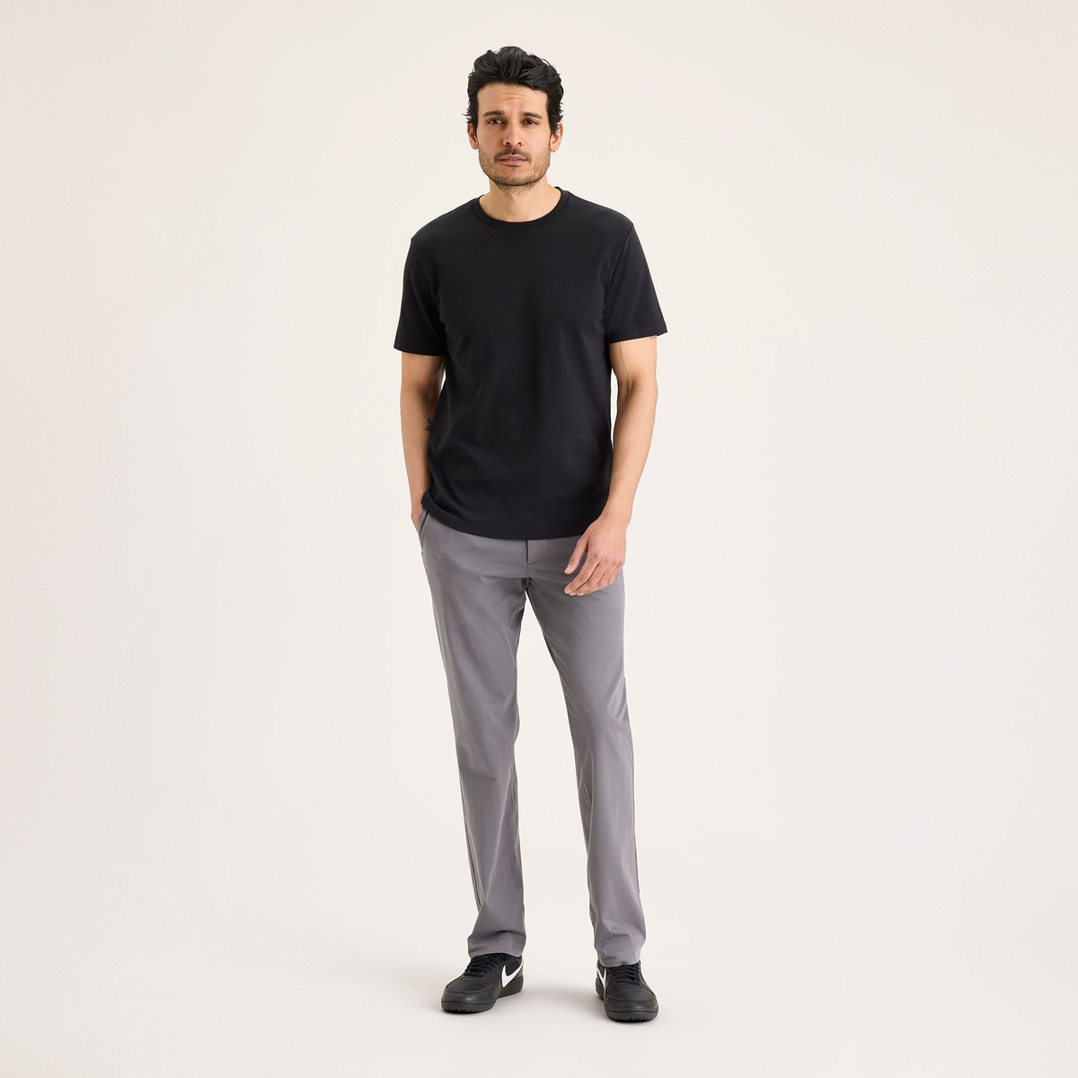 Front view of model wearing Car Park Grey Go Activeflex Chino, Slim Fit.