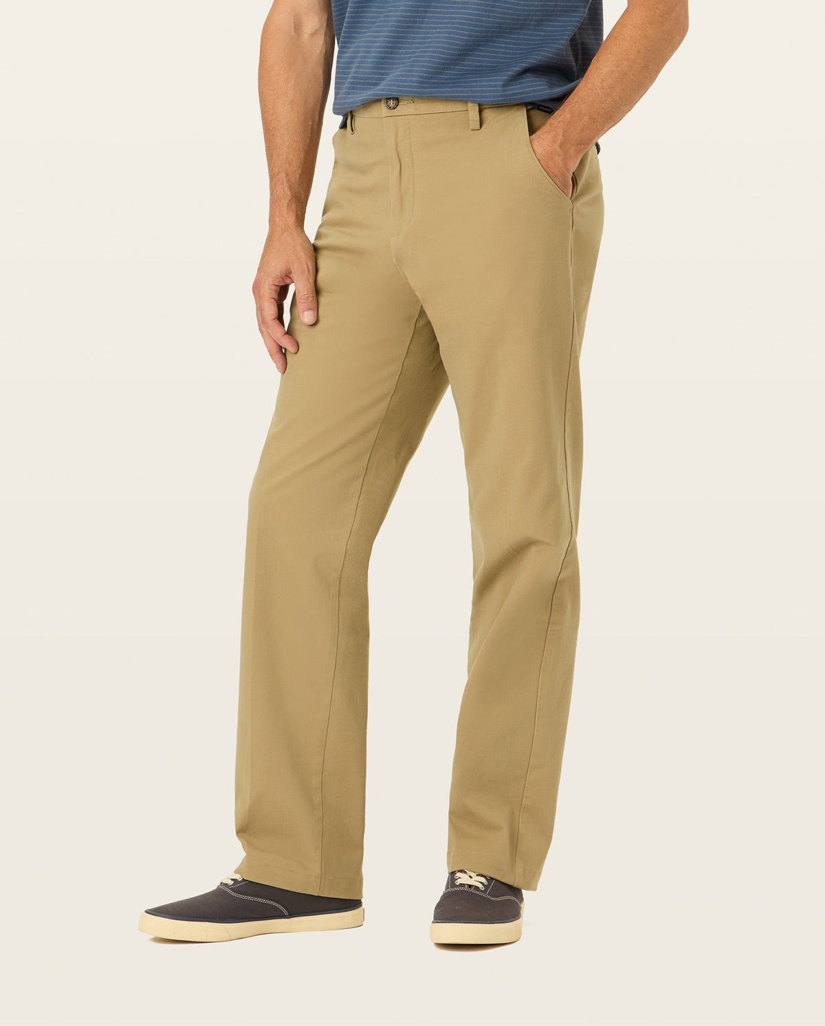 Side view of model wearing New British Khaki Workday Khakis, Classic Fit.